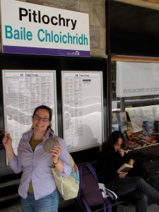 A knitter, some sticks, some string, and a train sign: Pitlochry