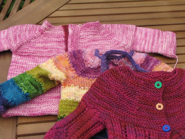 Three Baby Sweaters